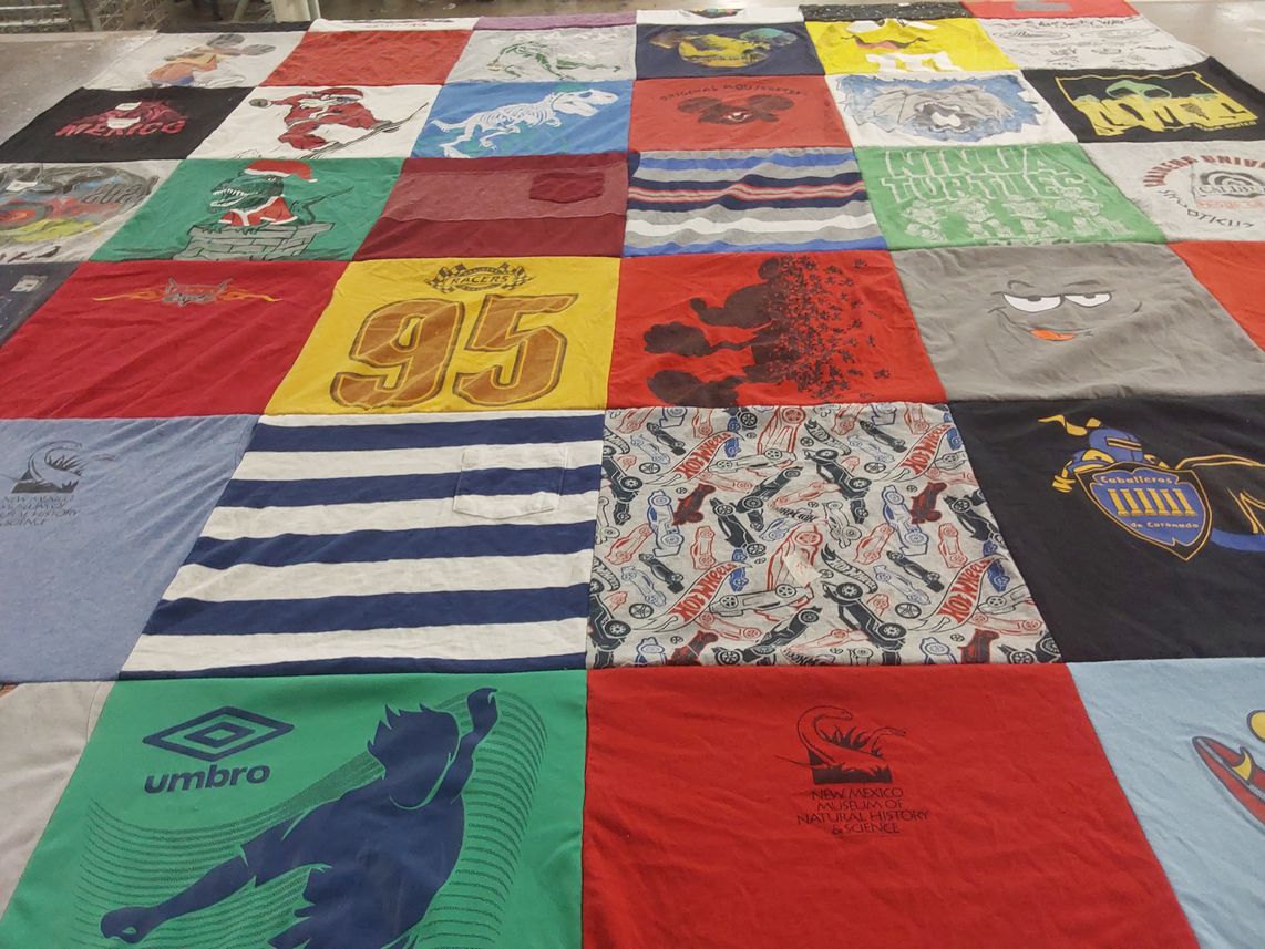 T-shirt quilt with sports, movies themes by Jetta Alison from NM