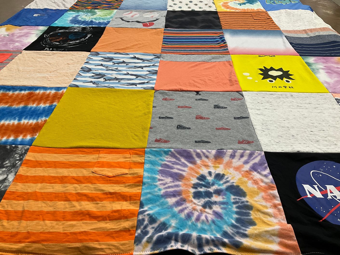 T-shirt quilt with space, ocean themes by Jetta Alison from NM