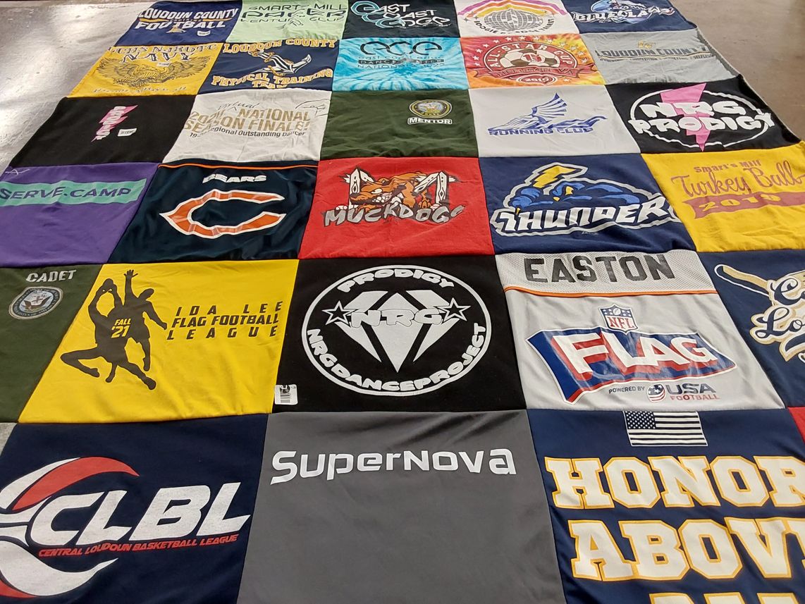 T-shirt quilt with football, basketball themes by Natalie  from VA