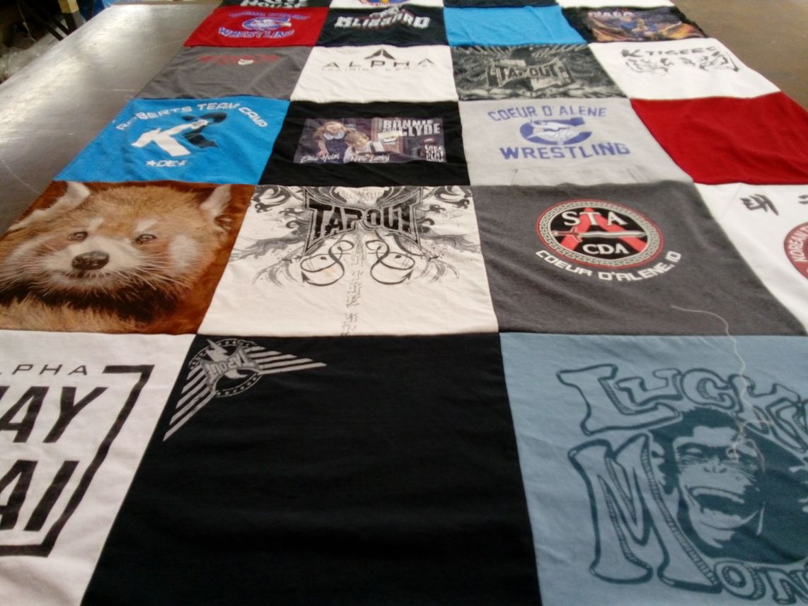 T-shirt quilt featuring coeur d'alene wrestling team by Christina from ID