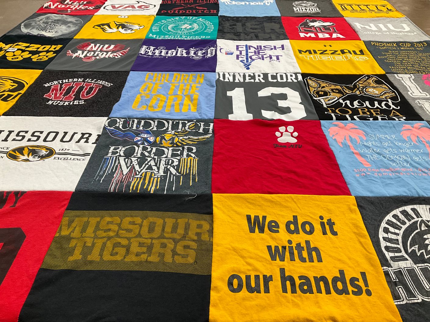 T-shirt quilt featuring missouri tigers, northern illinois huskies by Deena from IL