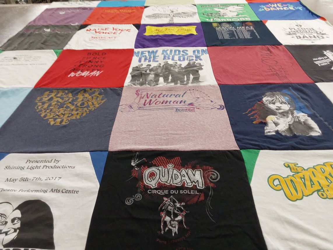 T-shirt quilt with theater, performance themes by Dalita from NY