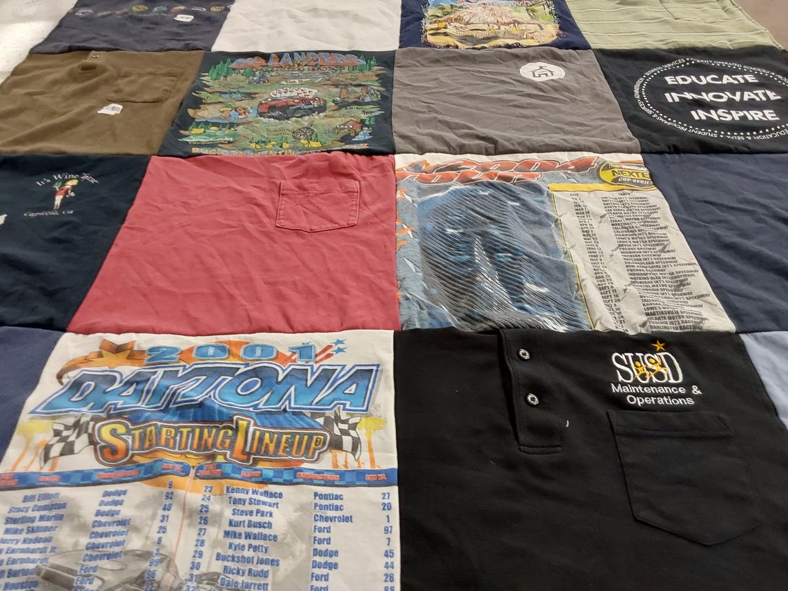 T-shirt quilt with racing, education themes by Kelley from CA