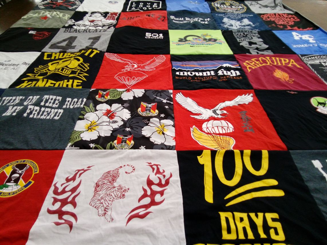 T-shirt quilt with fitness, travel themes by Madeline from CA