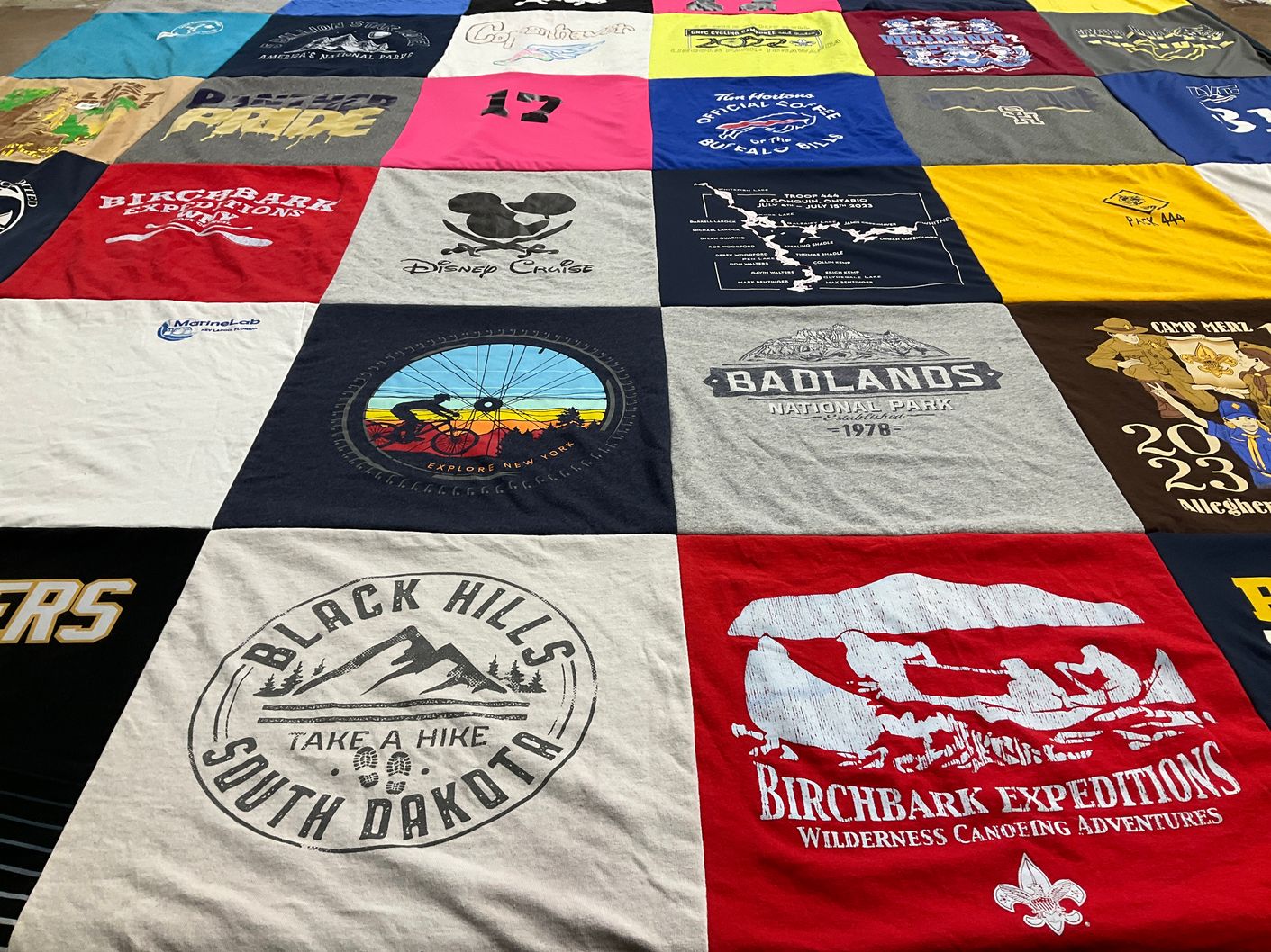 T-shirt quilt with adventure, travel themes by Jamie from NY