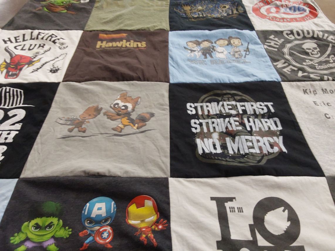 T-shirt quilt with comics, movies themes by Aeryn from WI