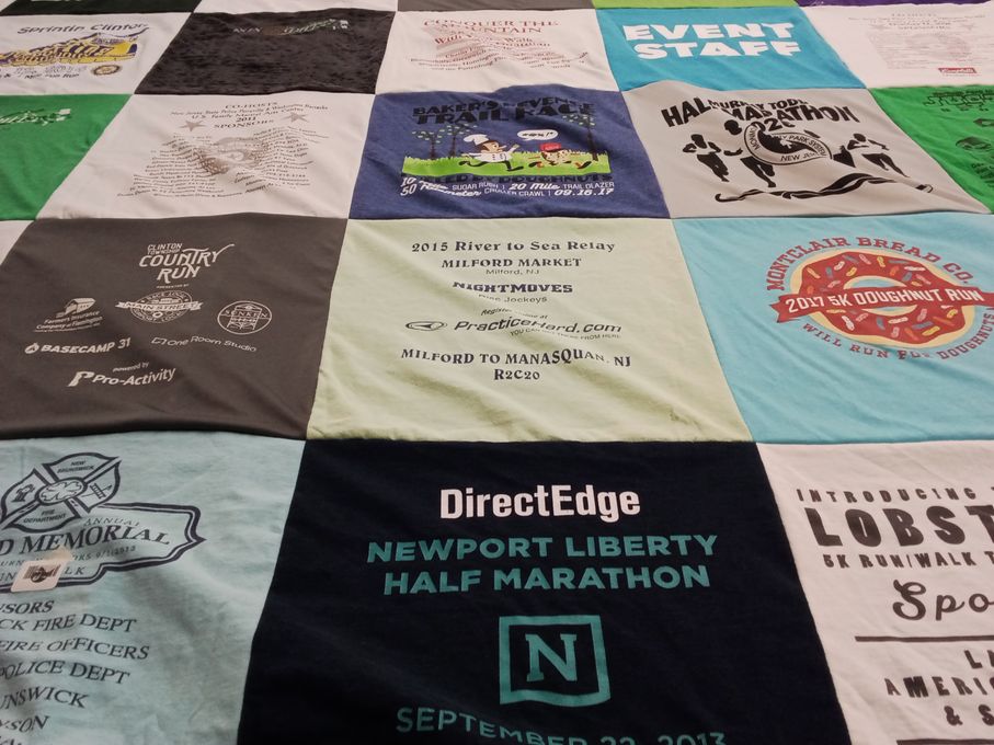 T-shirt quilt with running, events themes by Joanna from TX