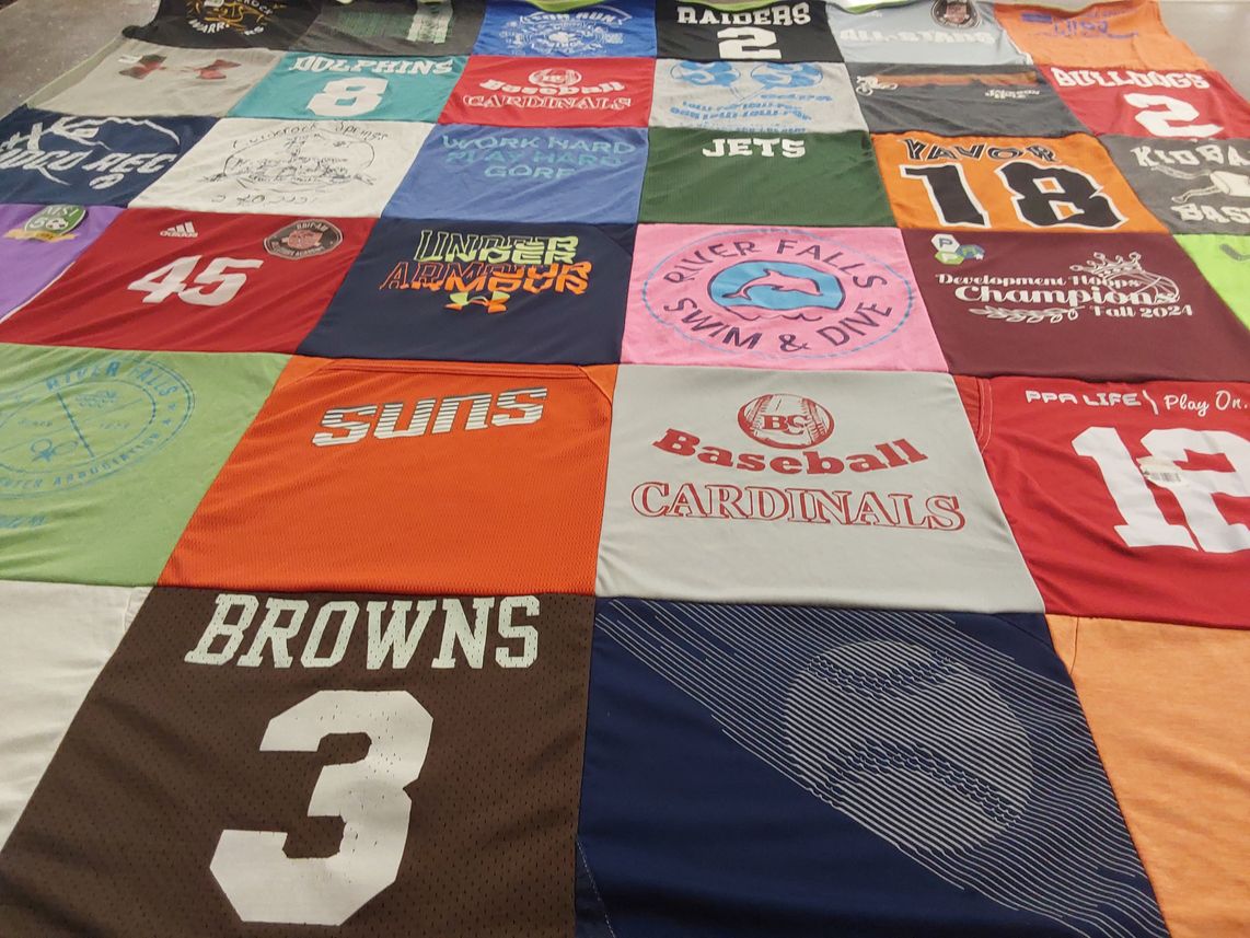 T-shirt quilt featuring browns, cardinals by Suzanne from MD