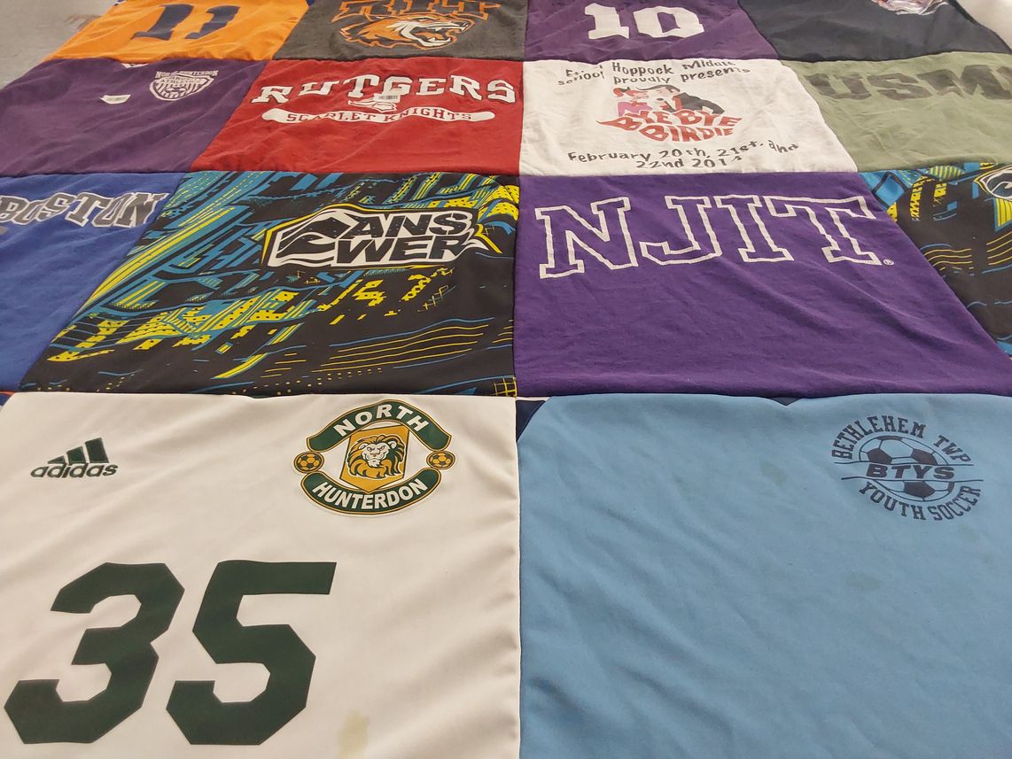 T-shirt quilt featuring north hunterdon high school, bethlehem township youth soccer by Joanna from TX
