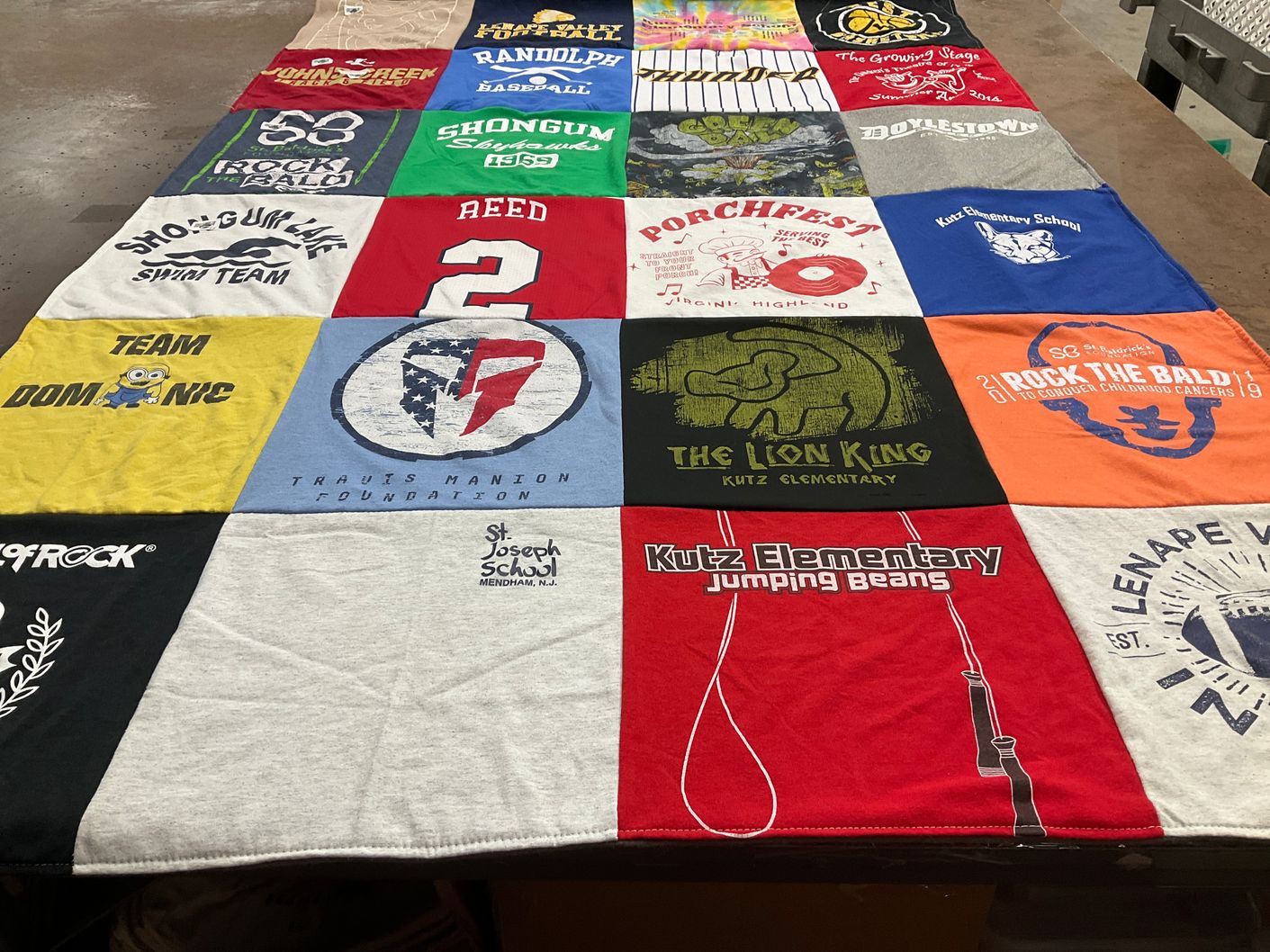 T-shirt quilt featuring swim team, team dominic by Margaret from GA