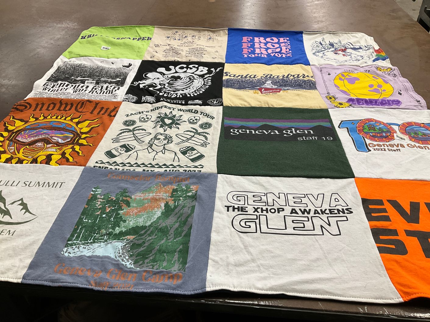 T-shirt quilt with camping, winter sports themes by Meg from CO