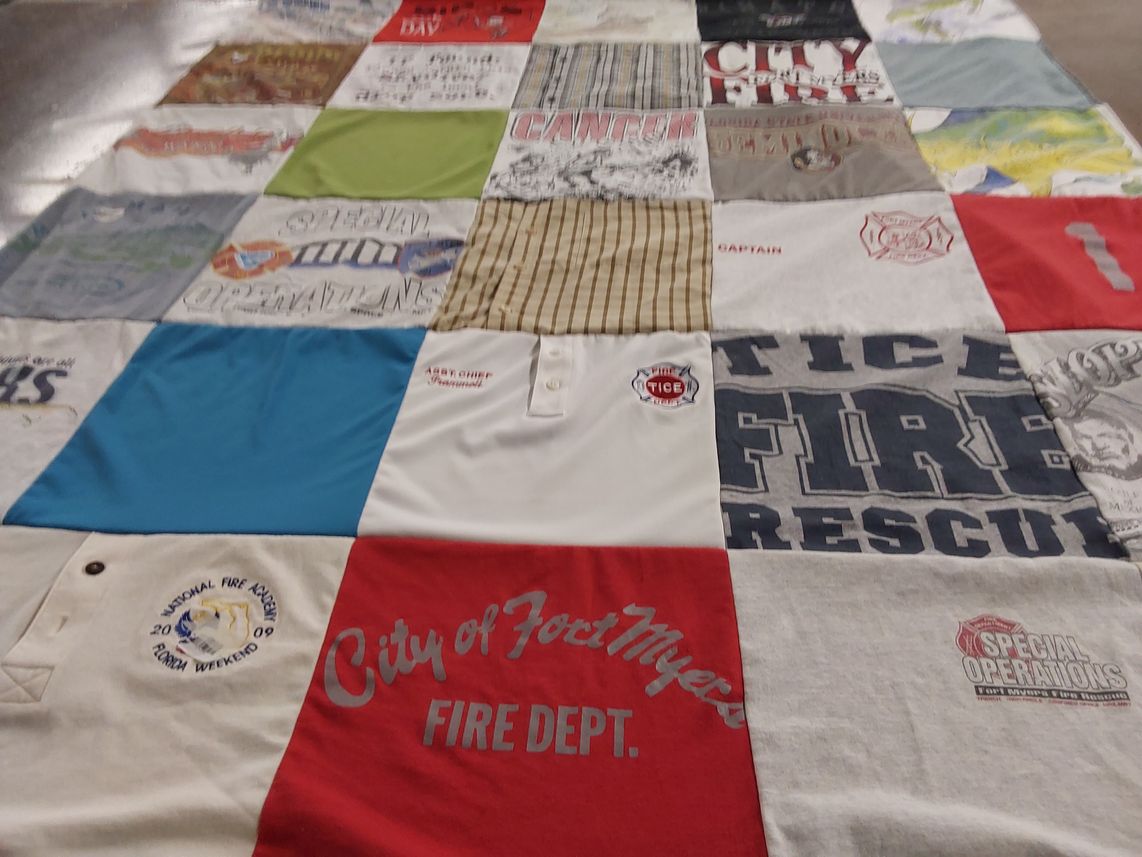 T-shirt quilt with firefighting, emergency services themes by Barbara from FL