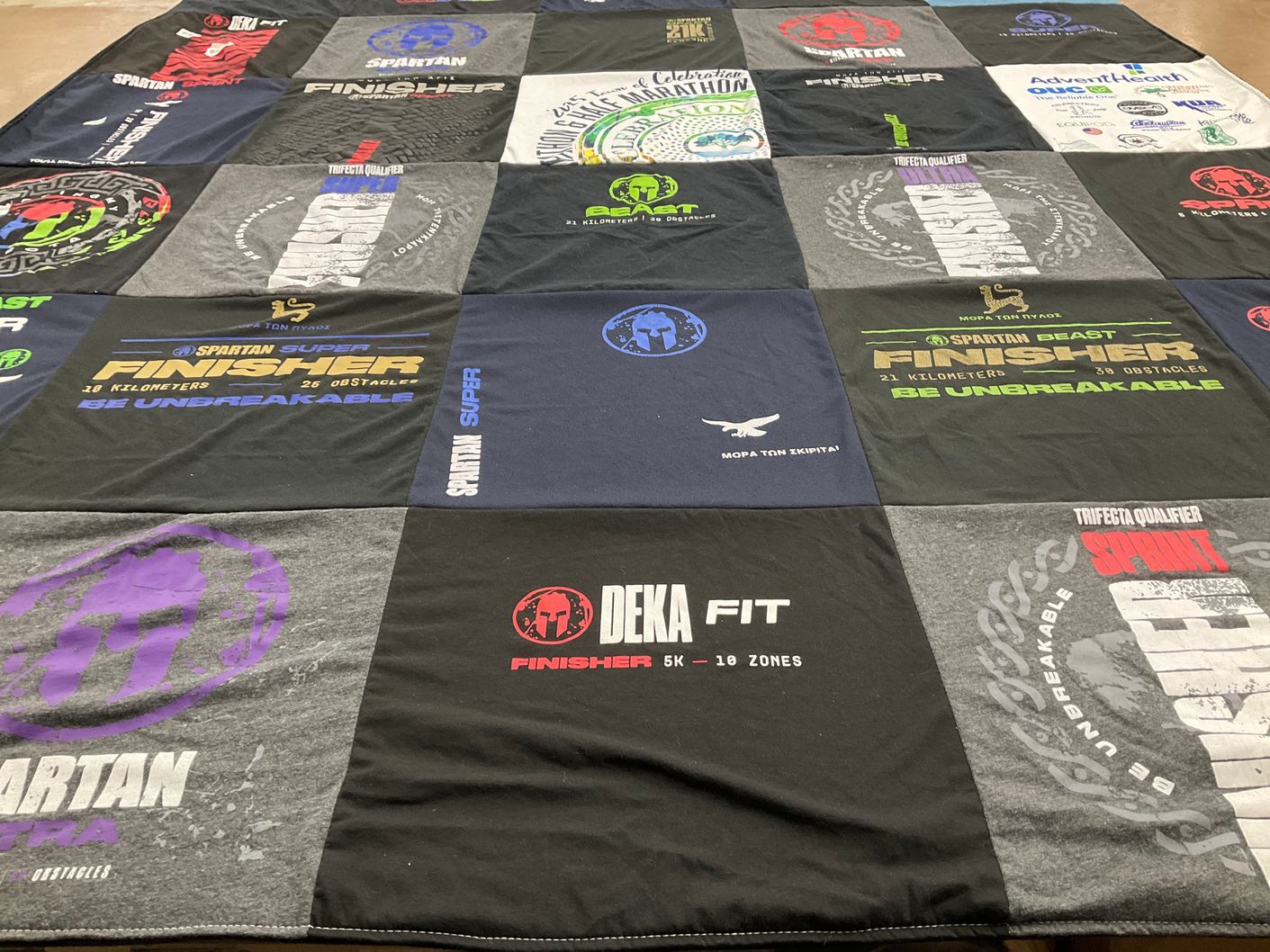 T-shirt quilt with obstacle racing, fitness themes by Lara from FL