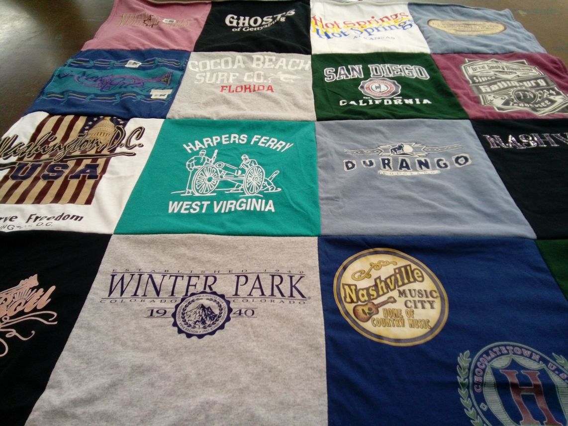 T-shirt quilt with travel, music themes by Debbie from OK