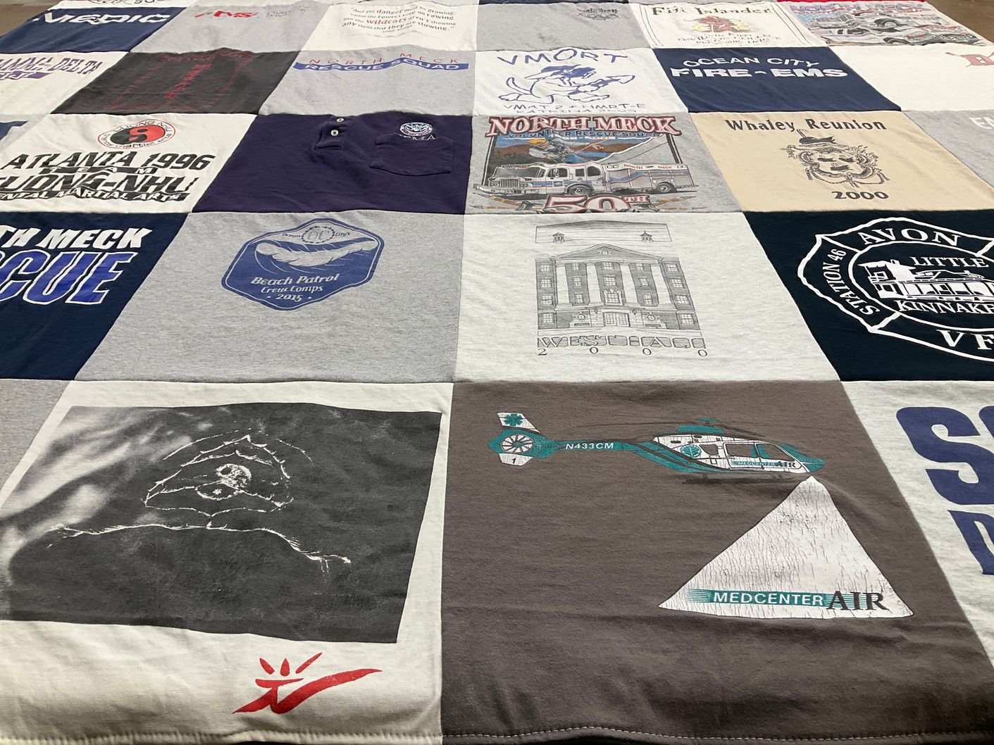T-shirt quilt with emergency services, beach activities themes by Michaela from NC
