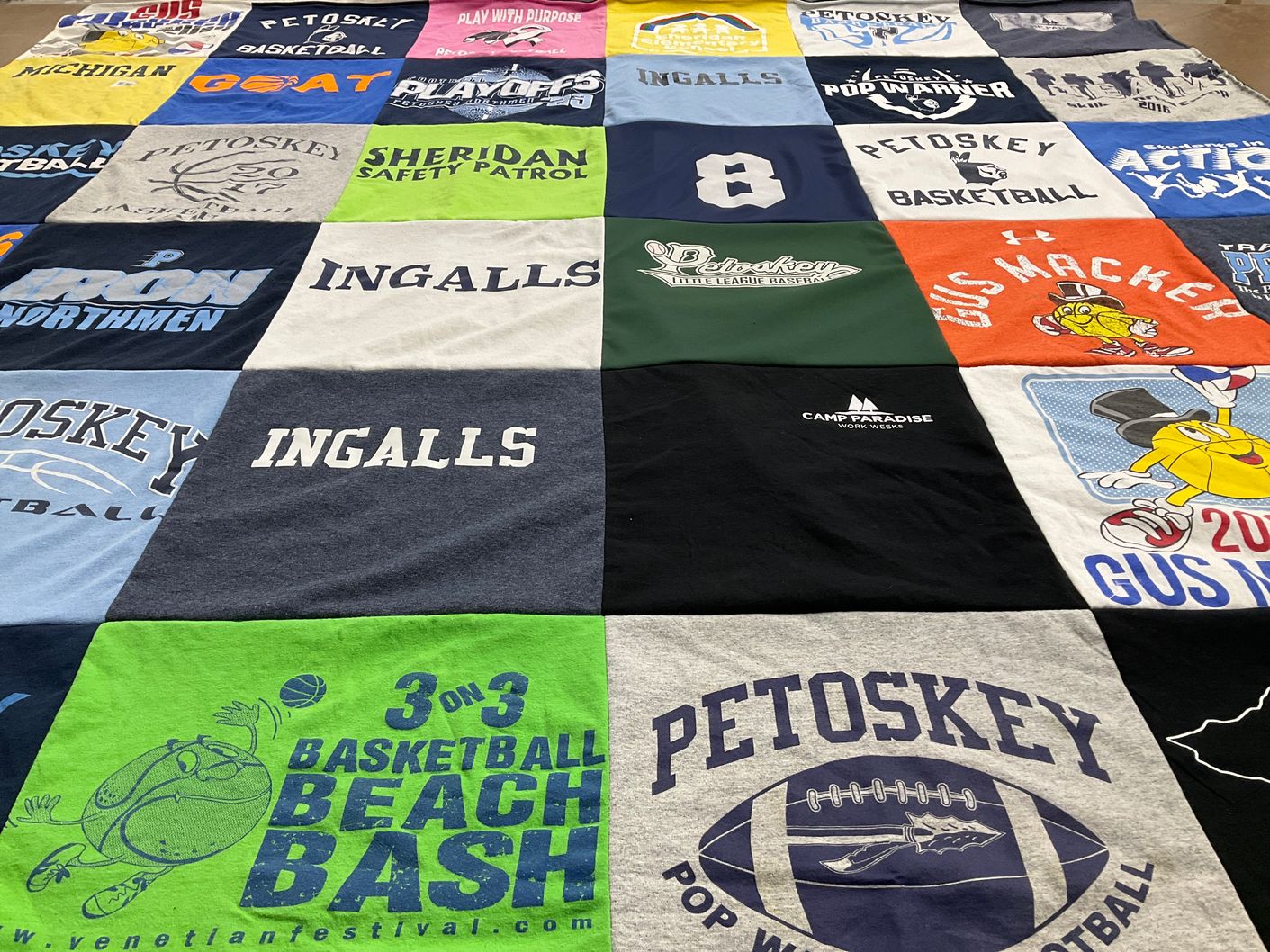 T-shirt quilt featuring petoskey basketball, petoskey pop warner football by Robin from MI