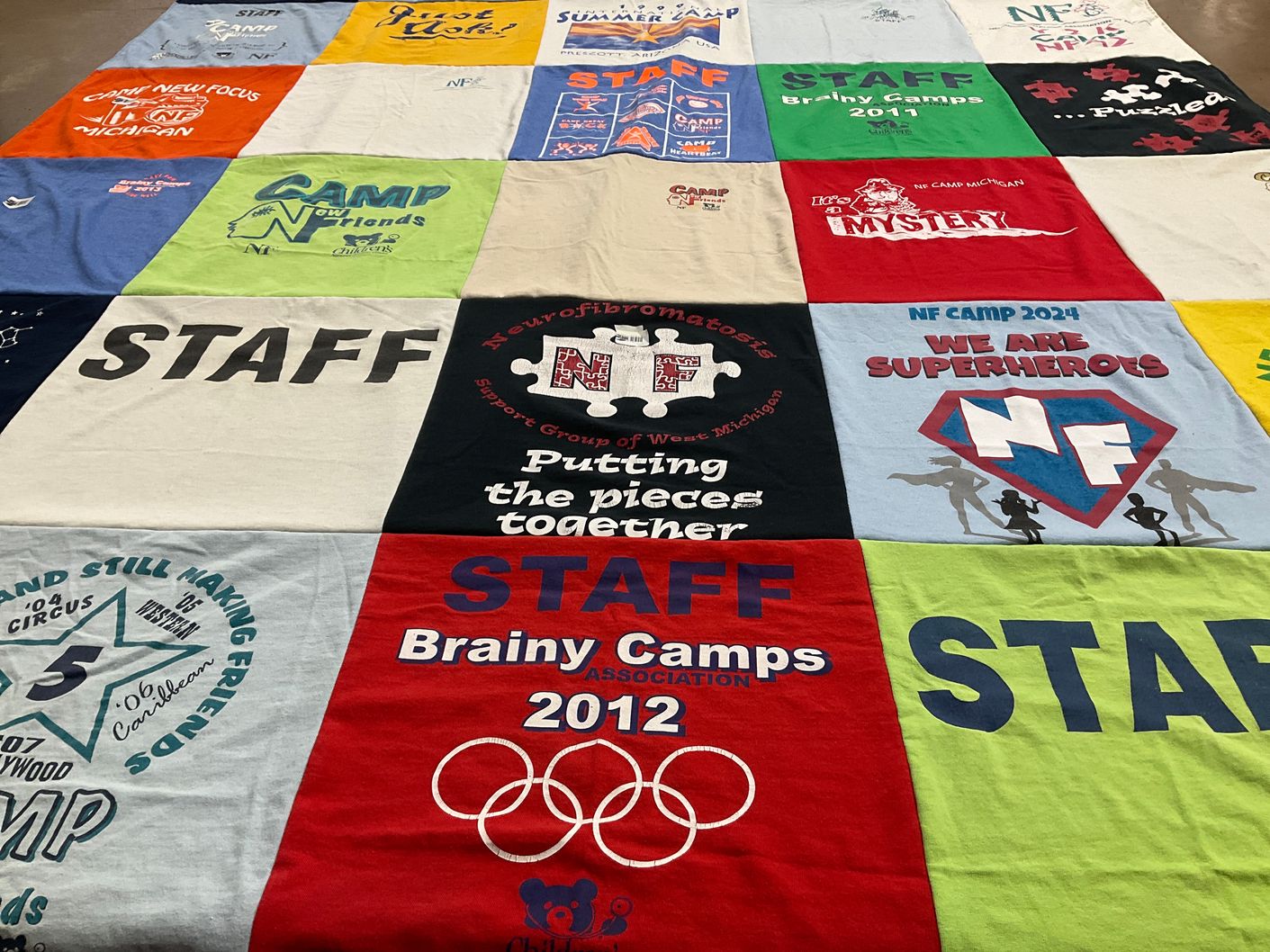 T-shirt quilt with camping, team building themes by Douglas from VA