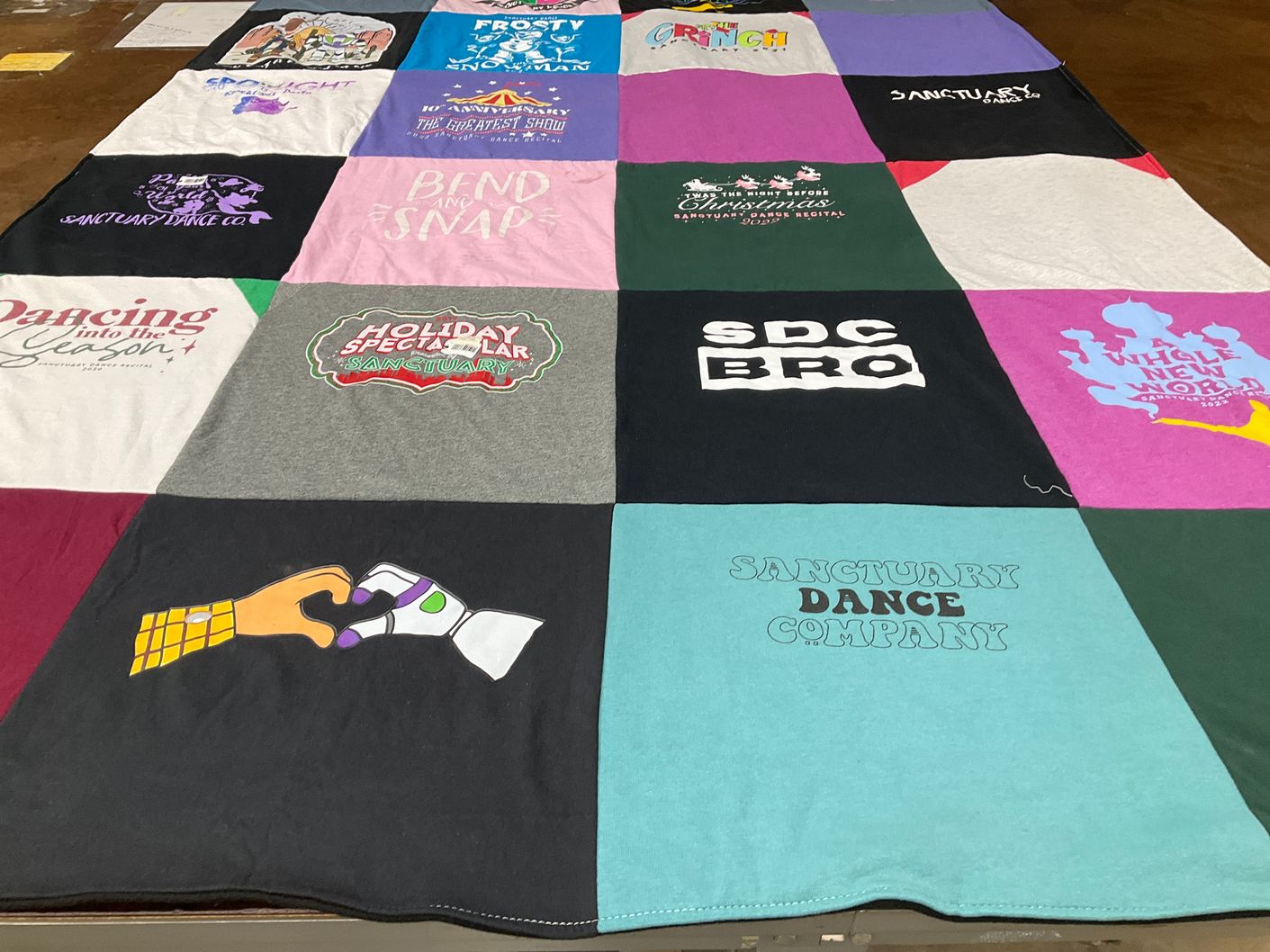 T-shirt quilt with dance, theater themes by Elizabeth from WA