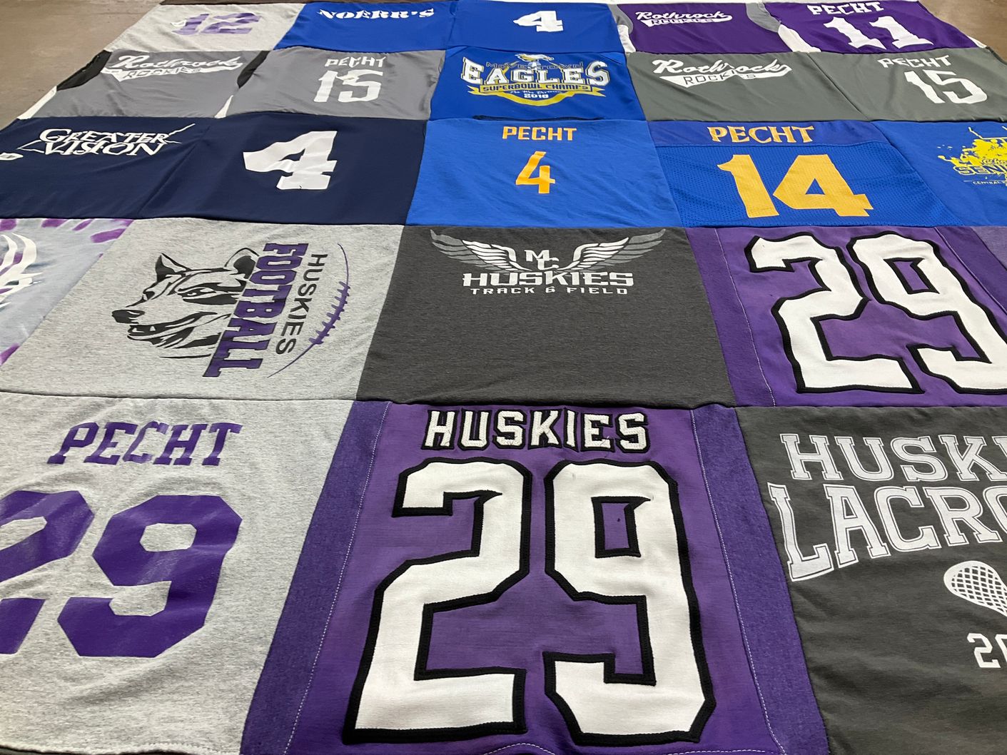 T-shirt quilt featuring huskies track and field, huskies football by LINDSAY from PA