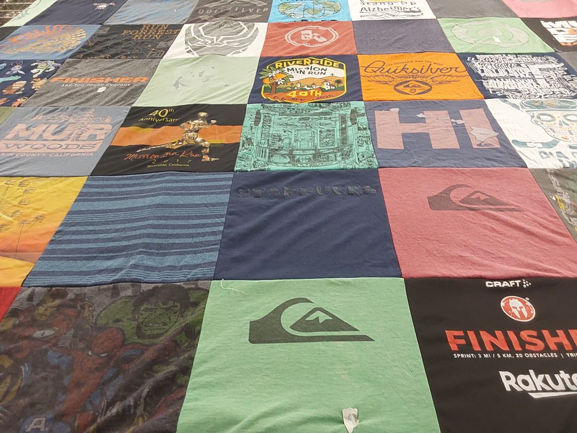 T-shirt quilt with running, sports themes by Daniel from CA