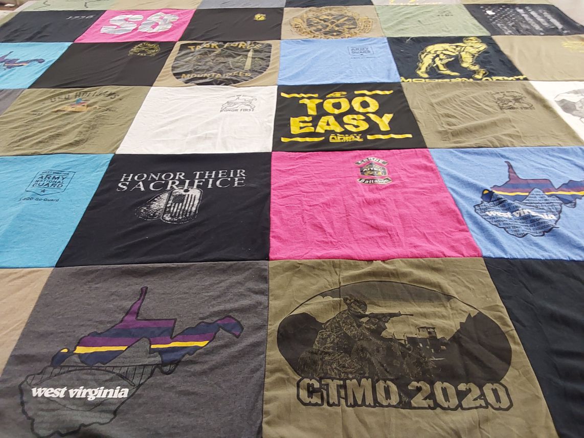 T-shirt quilt with military, outdoors themes by Jenny from WV