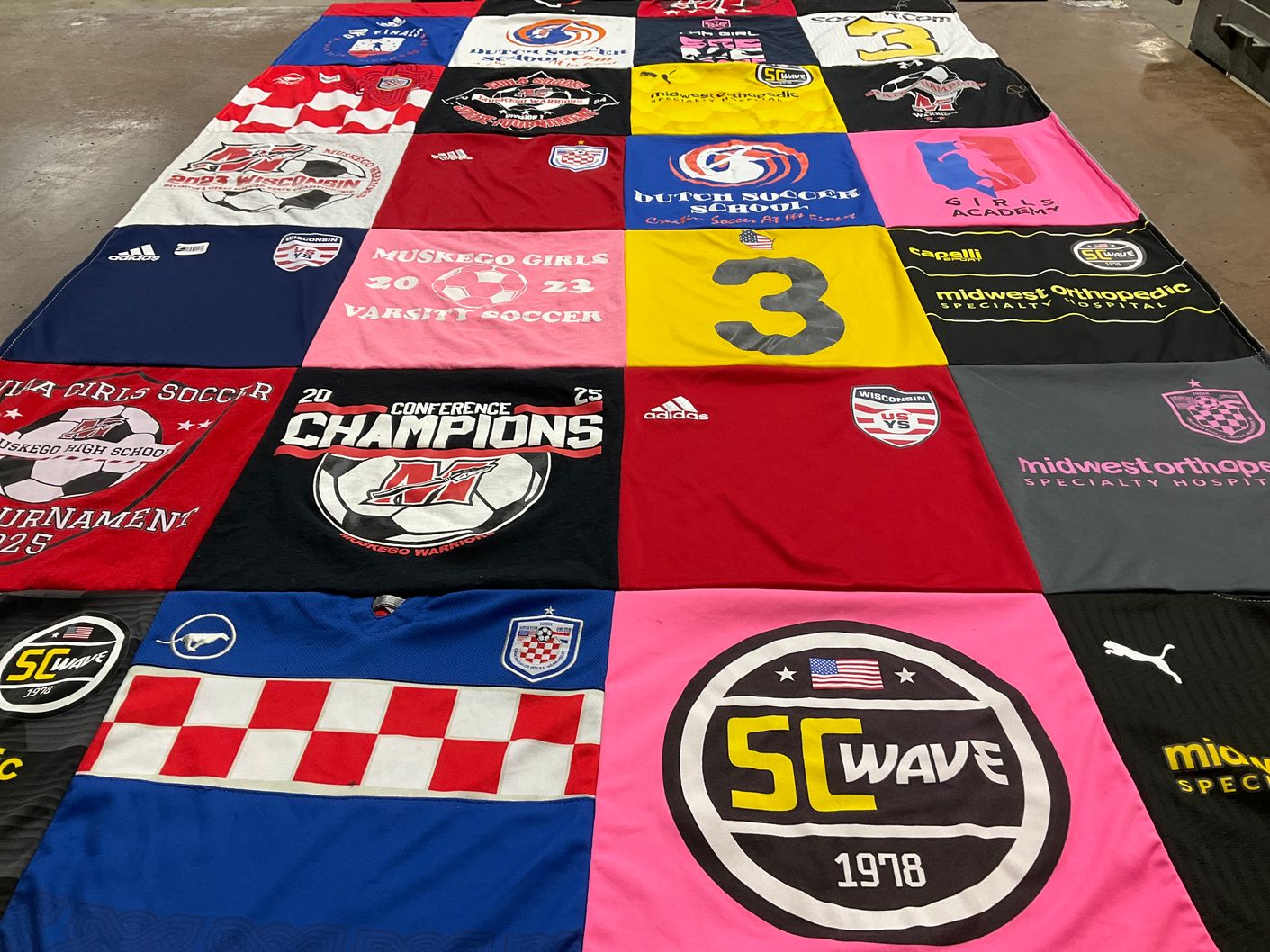 T-shirt quilt featuring sc wave by Lori from WI