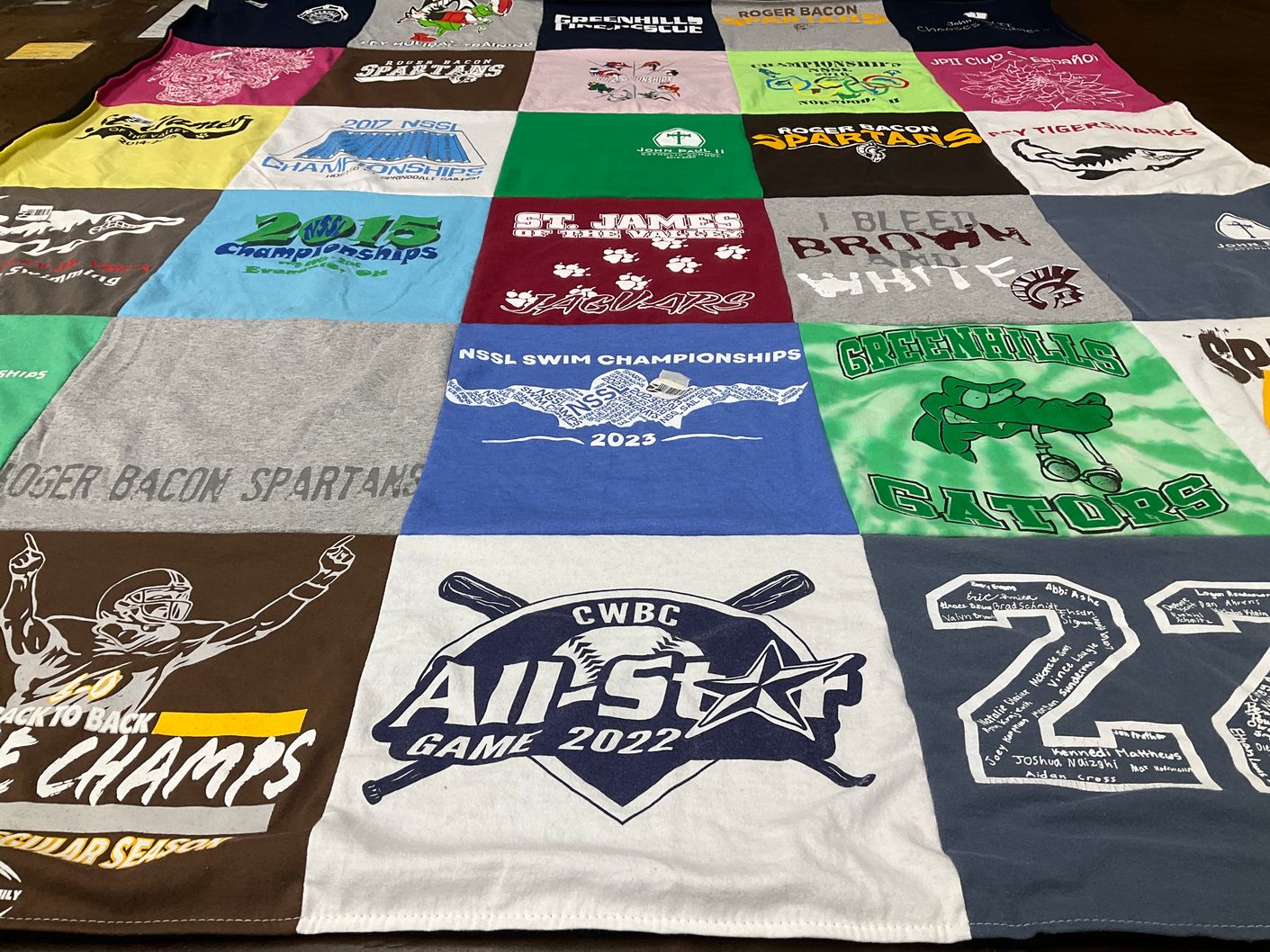 T-shirt quilt featuring greenhills gators, roger bacon spartans by Rebecca from OH