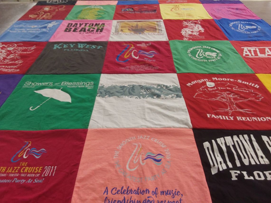 T-shirt quilt with music, travel themes by Laura from VA