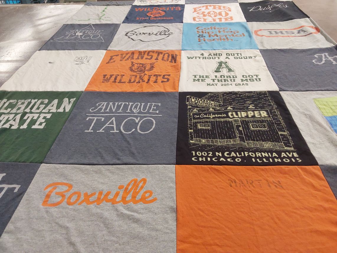 T-shirt quilt from michigan state university, evanston township high school by Alexander from IL
