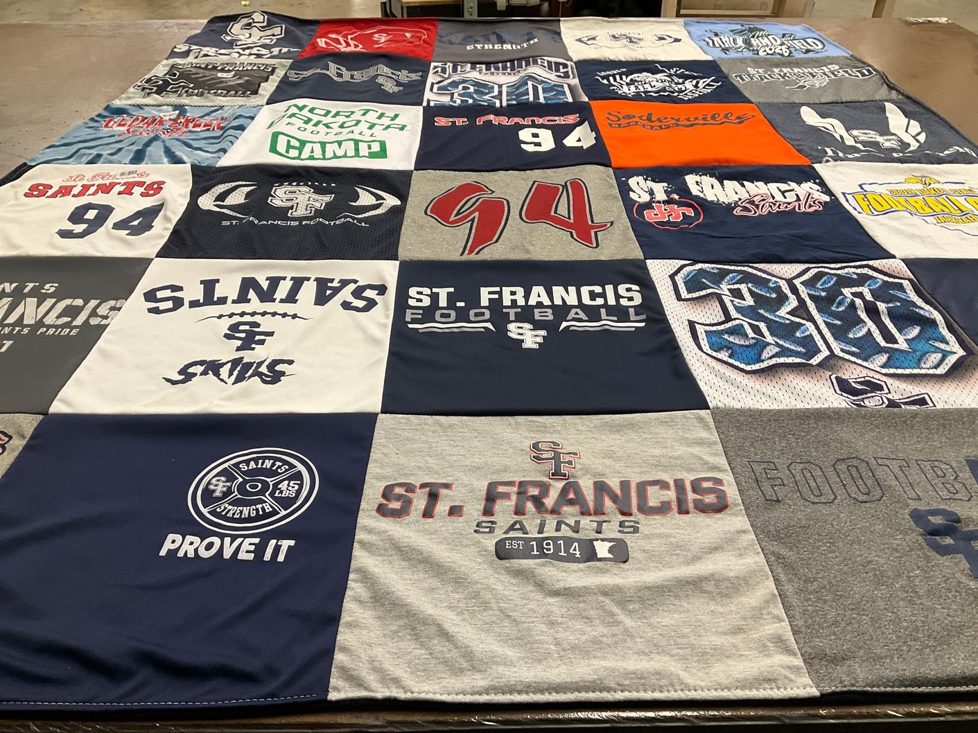 T-shirt quilt featuring st. francis saints by LuAnn from MN