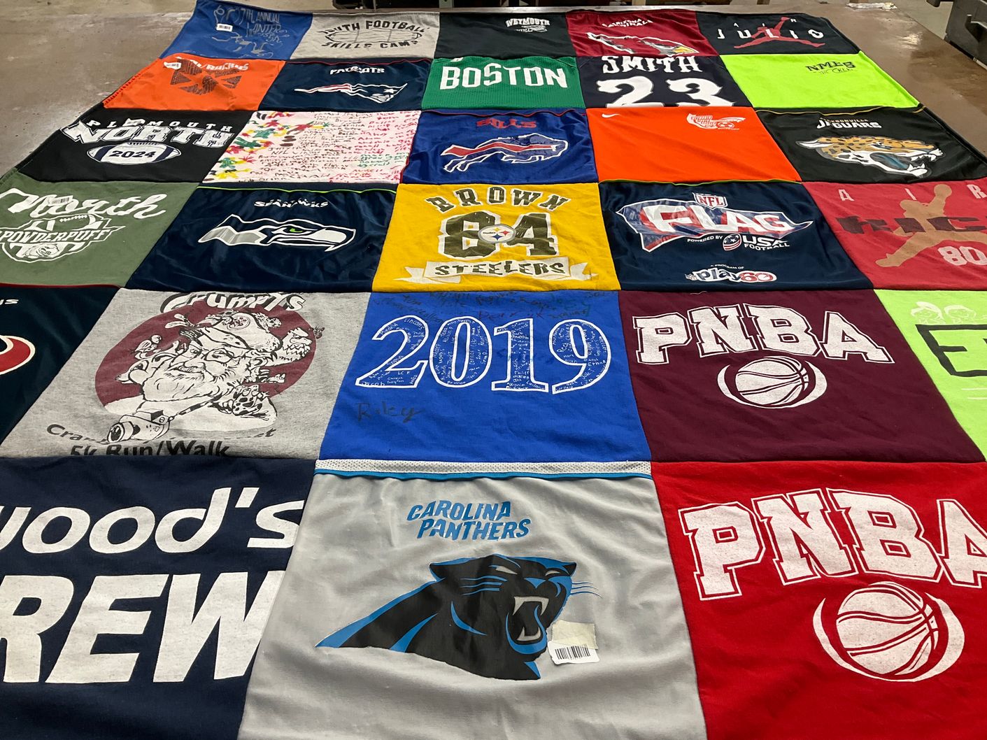 T-shirt quilt featuring carolina panthers, seattle seahawks by Jennifer from MA
