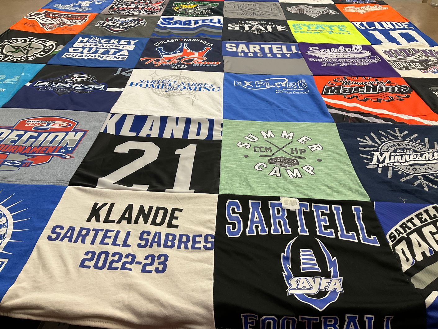 T-shirt quilt featuring sartell sabres, sartell football by Chana from MN