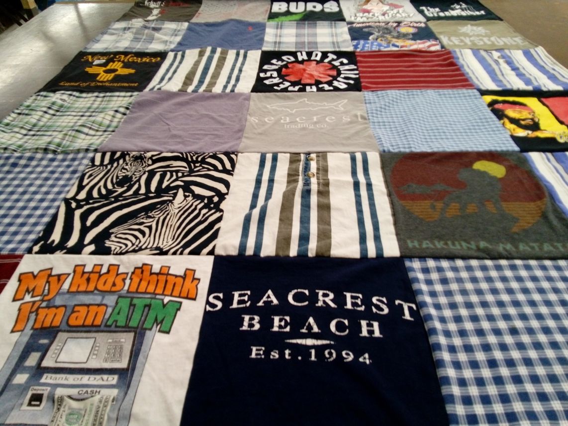 T-shirt quilt with travel, family themes by Lizandra from TX