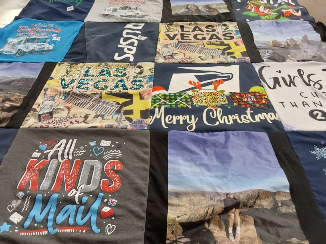 T-shirt quilt with travel, mail themes by Cathleen from TN