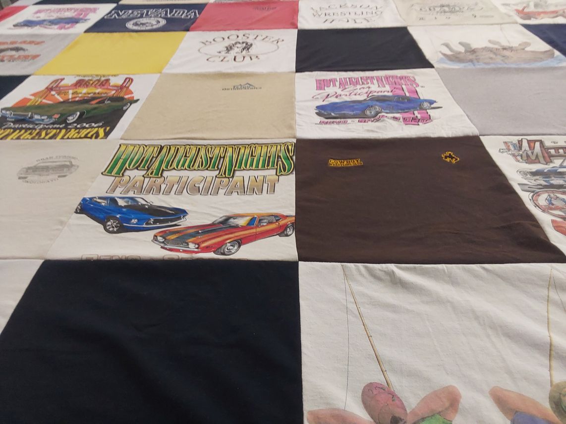 T-shirt quilt with cars, wrestling themes by Brooke from WY