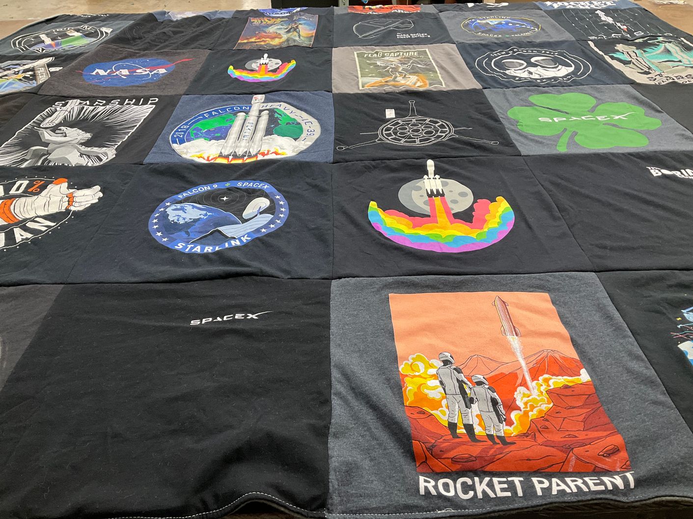 T-shirt quilt with space exploration, rocketry themes by Lacey from CA