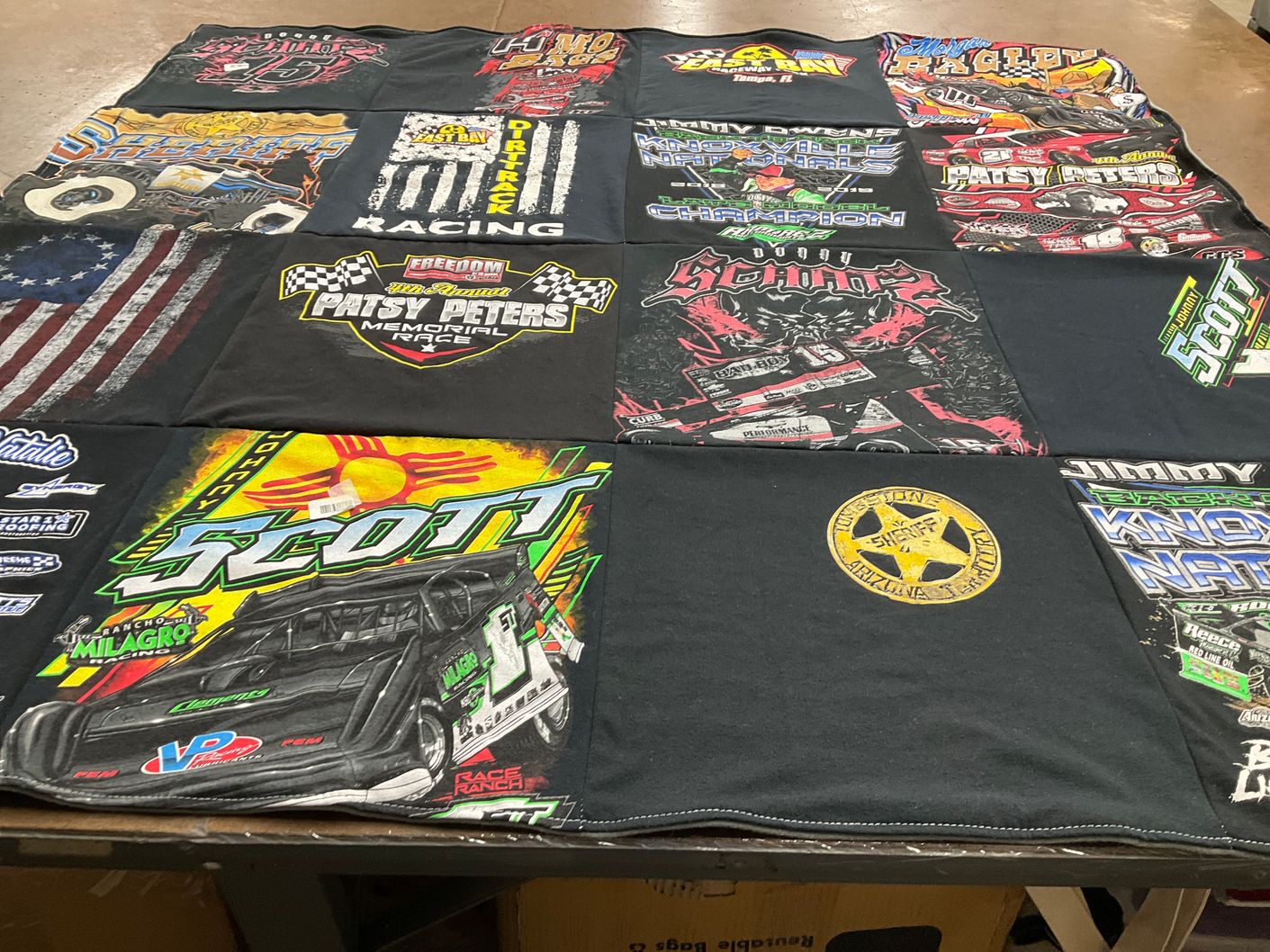 T-shirt quilt with racing themes by Gloria from TX