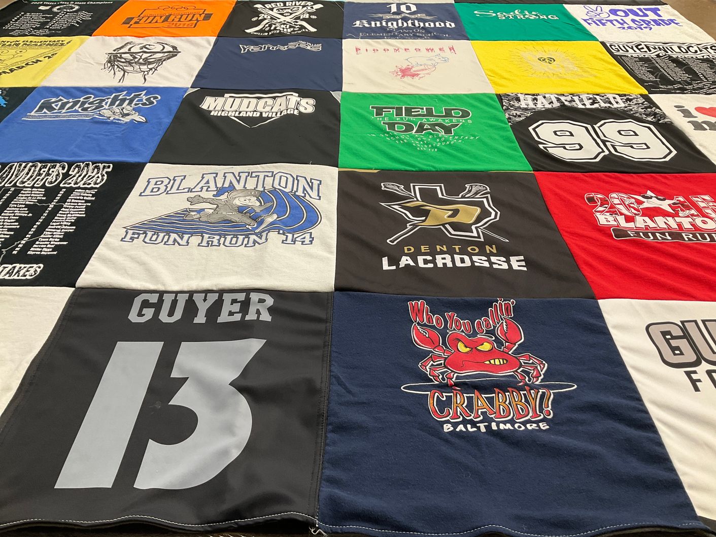 T-shirt quilt featuring denton lacrosse team by Carrie from TX