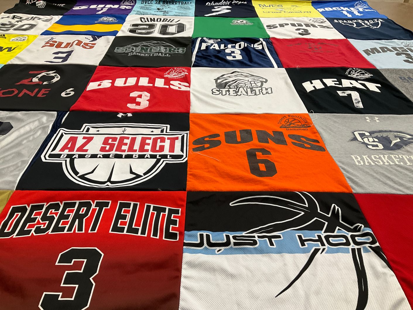 T-shirt quilt featuring suns, bulls by Kathleen from AZ