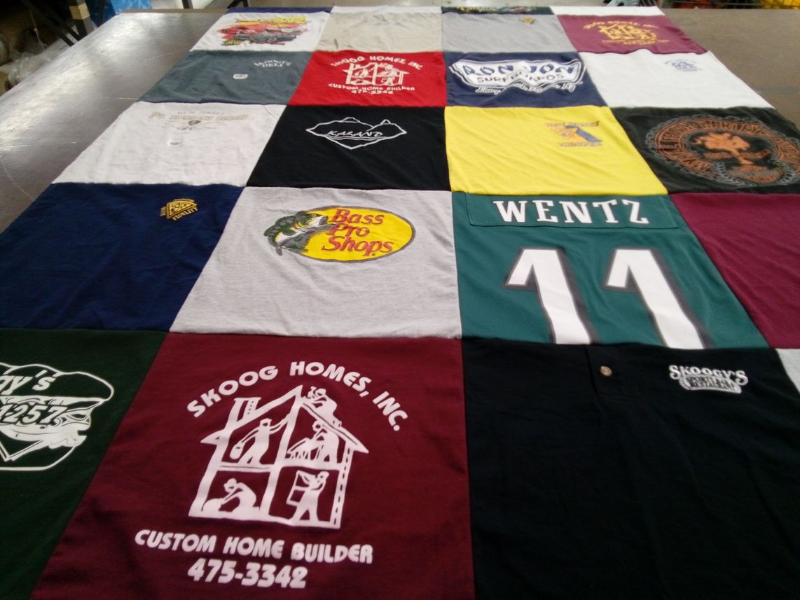 T-shirt quilt with construction, fishing themes by Anne from NJ