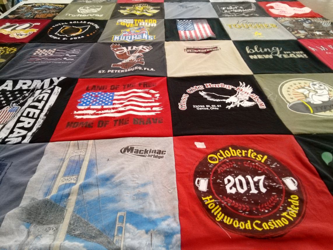 T-shirt quilt with veterans, fishing themes by Susan from OH