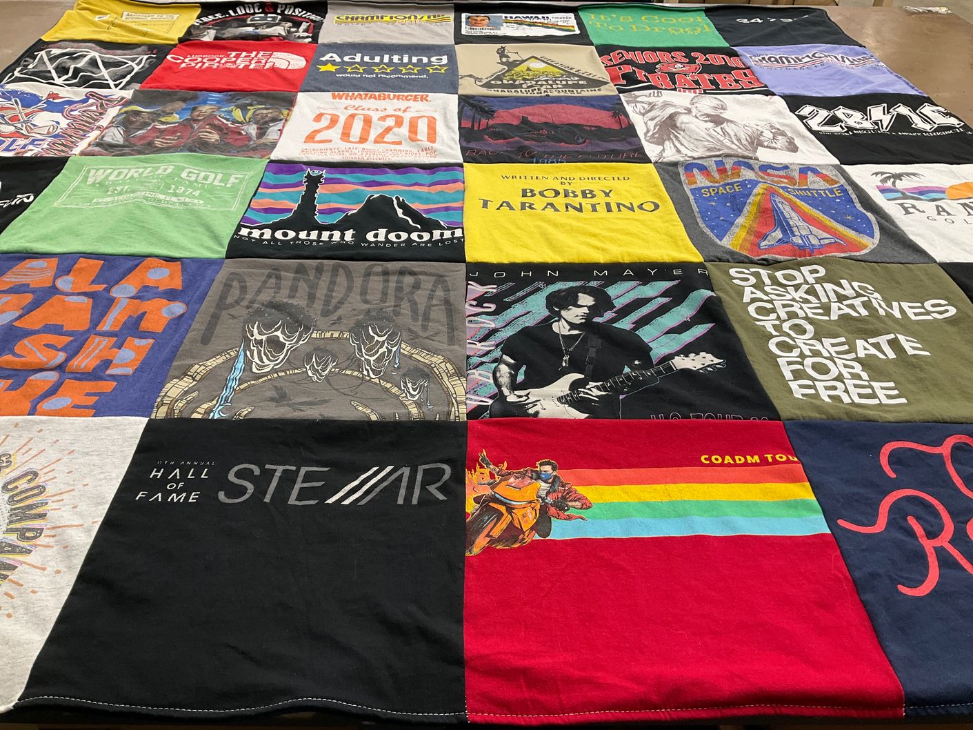 T-shirt quilt with music, golf themes by Cole from TX