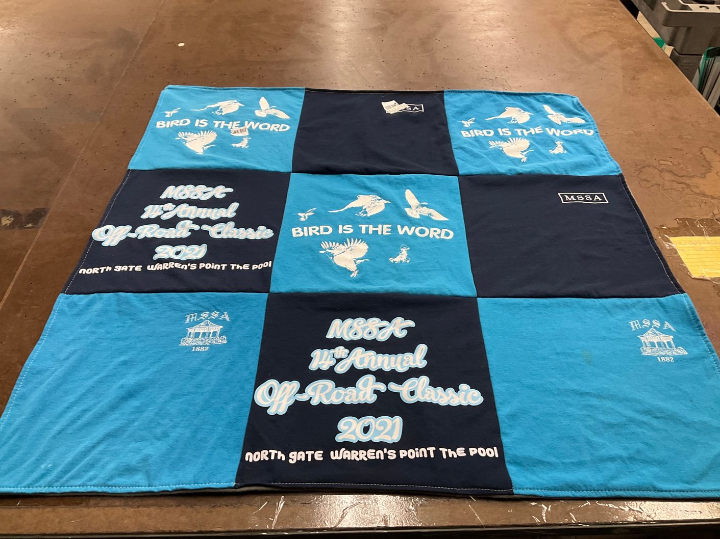 T-shirt quilt with outdoor events, bird watching themes by Christine from VA