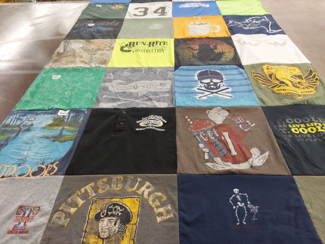 T-shirt quilt with outdoor activities, cooking themes by Katie from NY