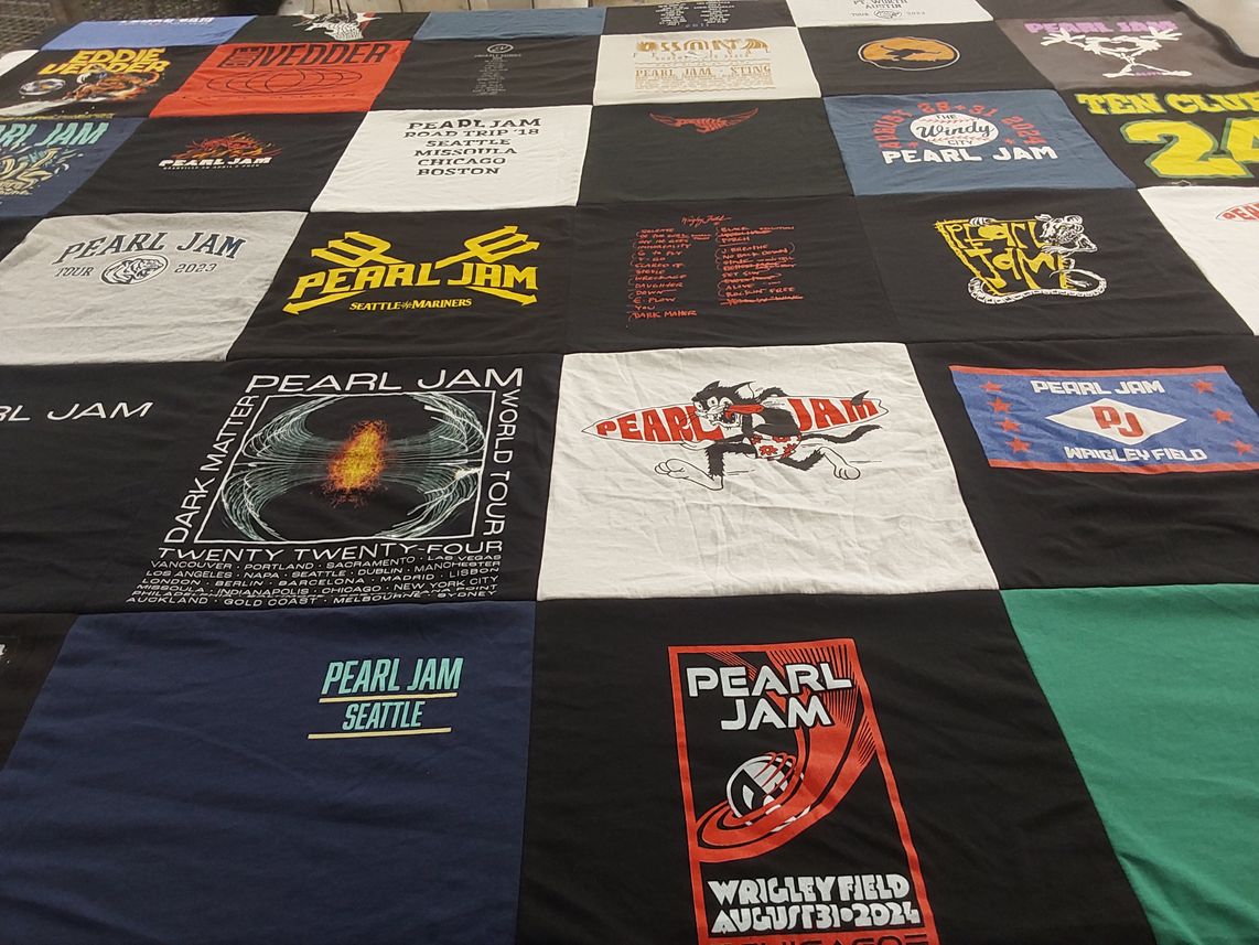 T-shirt quilt with music, concerts themes by Angi from WA