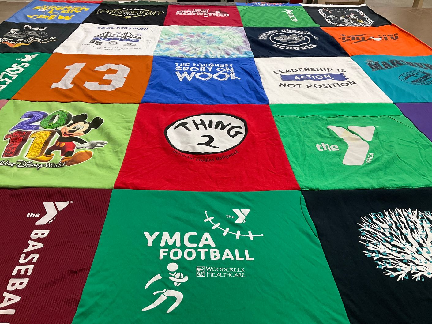 T-shirt quilt with sports, disney themes by Leanna from WA