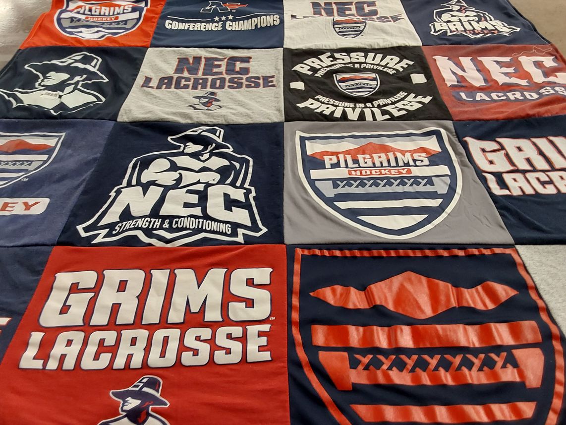 T-shirt quilt featuring grims lacrosse, pilgrims hockey by Mary from MA