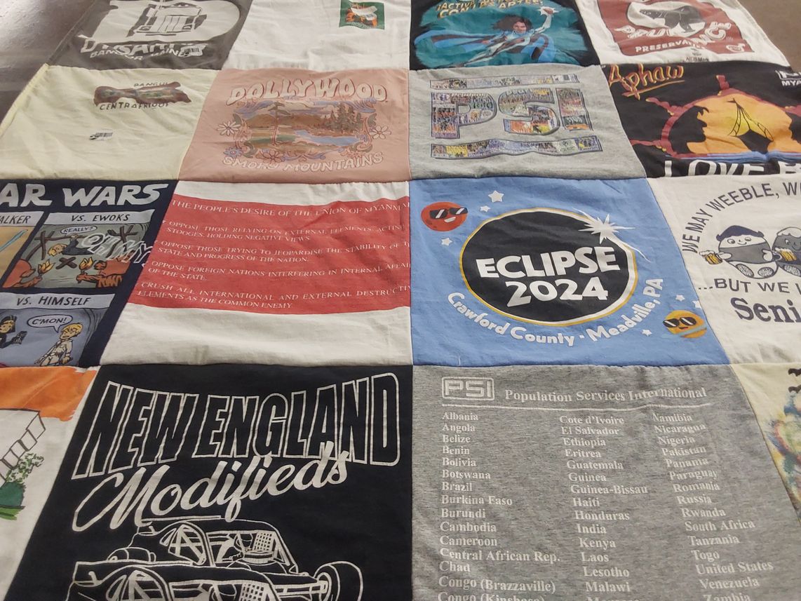 T-shirt quilt with movies, travel themes by Ellyson from MA