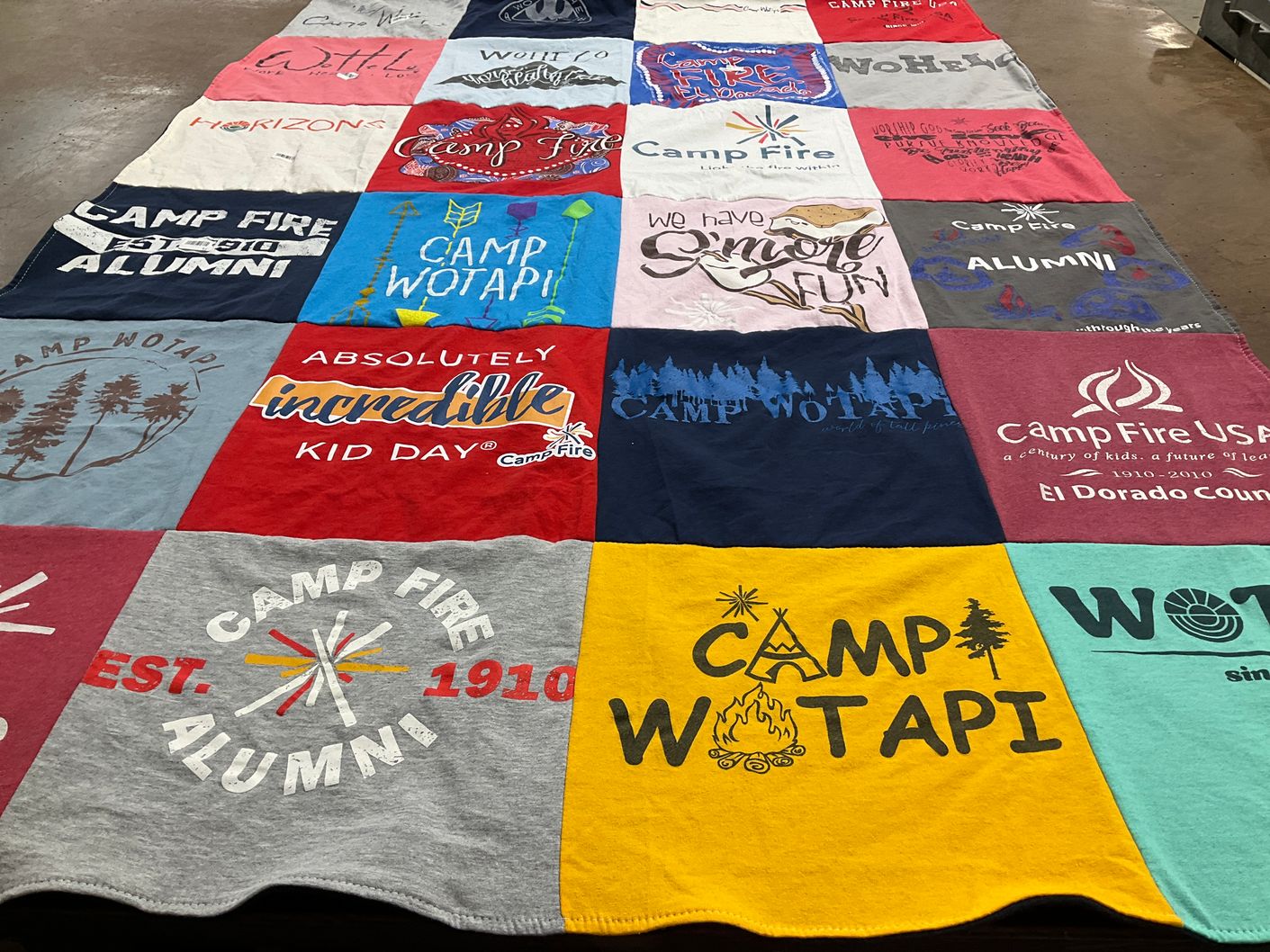 T-shirt quilt with camping, outdoor activities themes by Leanne from AR