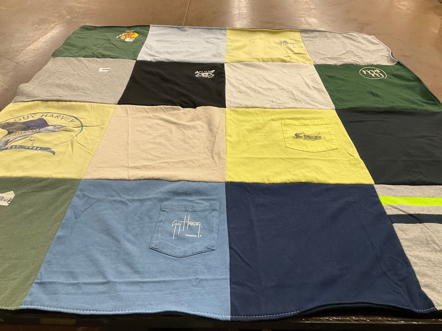 T-shirt quilt with fishing, marine life themes by Andrea from FL